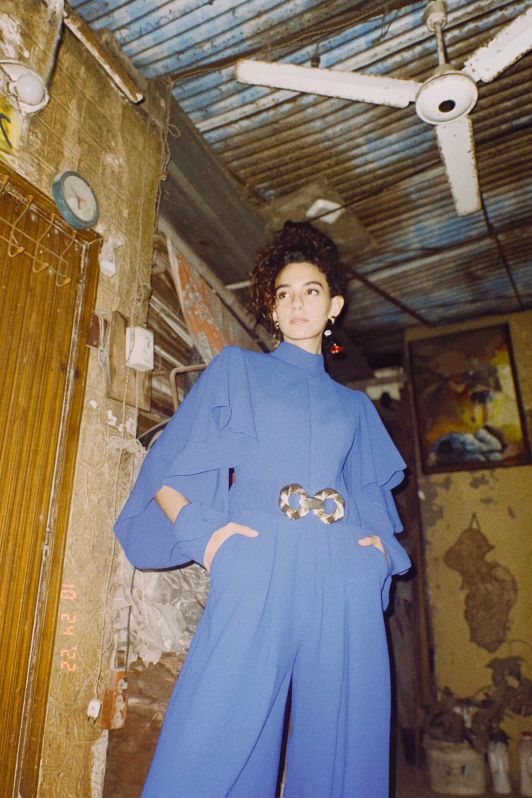 Long sleeve ruffled jumpsuit in Blue
