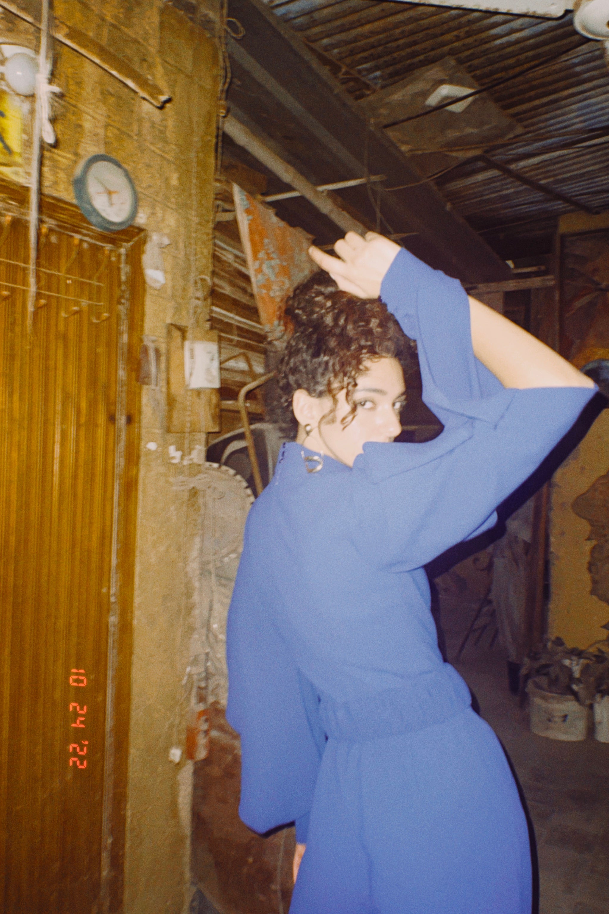 Long sleeve ruffled jumpsuit in Blue