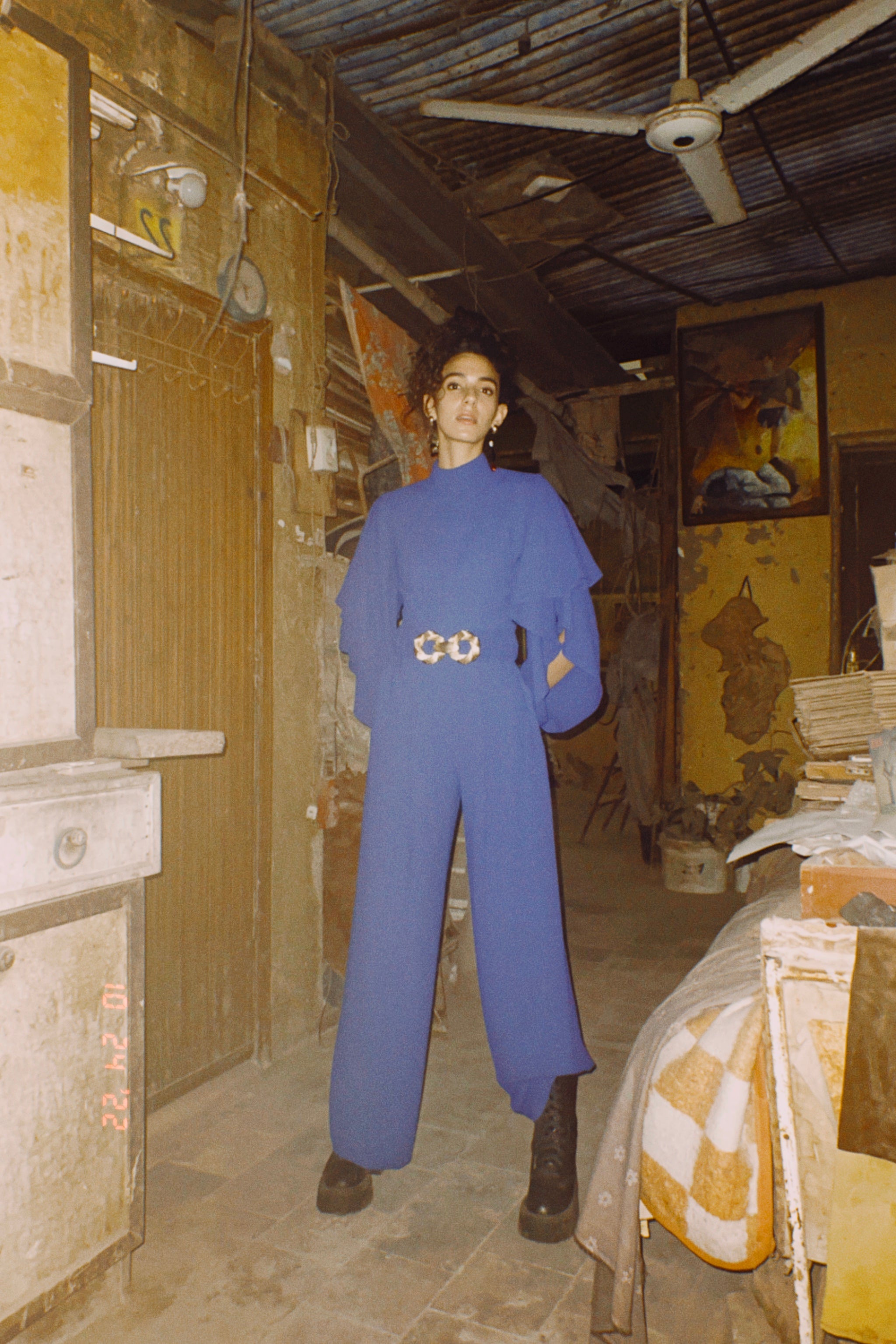 Long sleeve ruffled jumpsuit in Blue