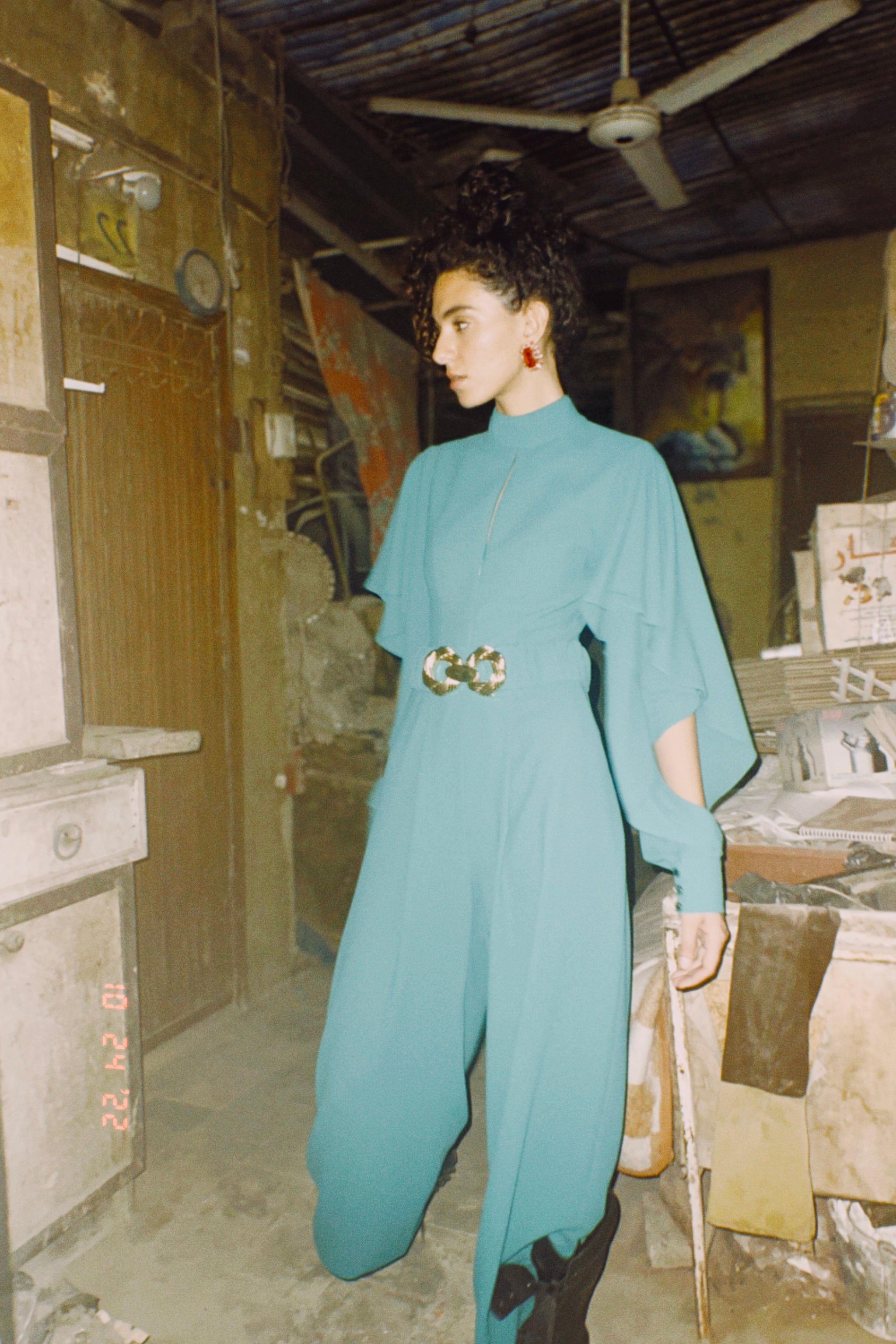 Long sleeve ruffled jumpsuit in Teel