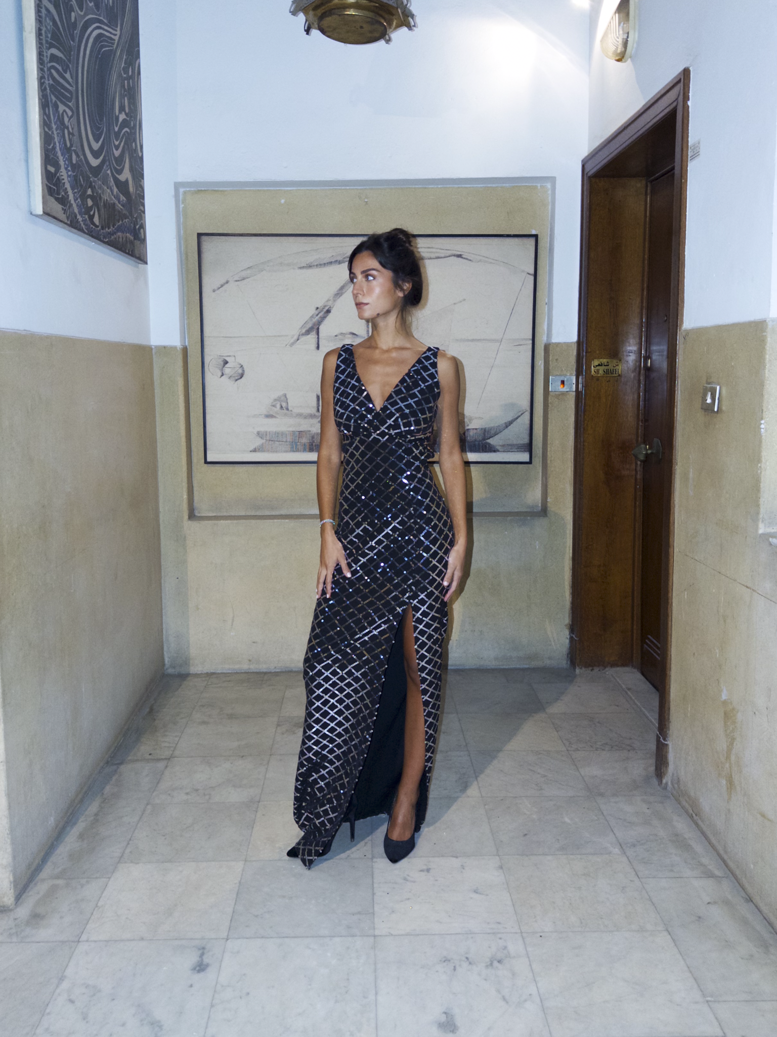 Sleeveless long dress with silver sequins