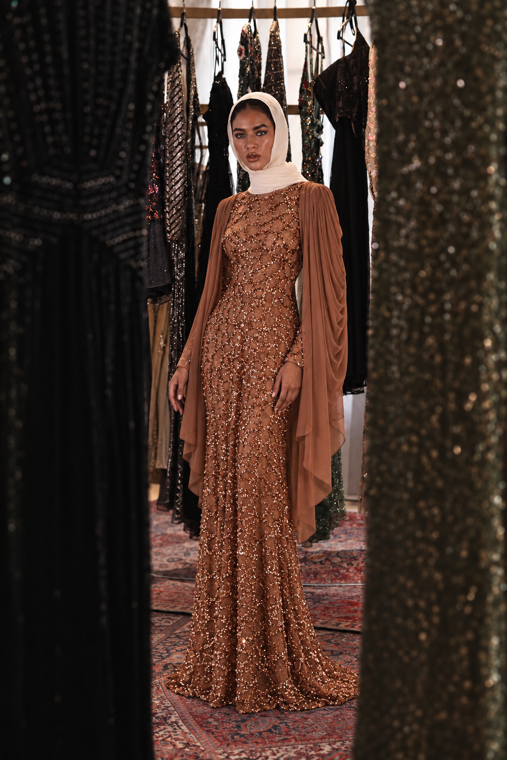 Long sleeve dress in rose gold with draping