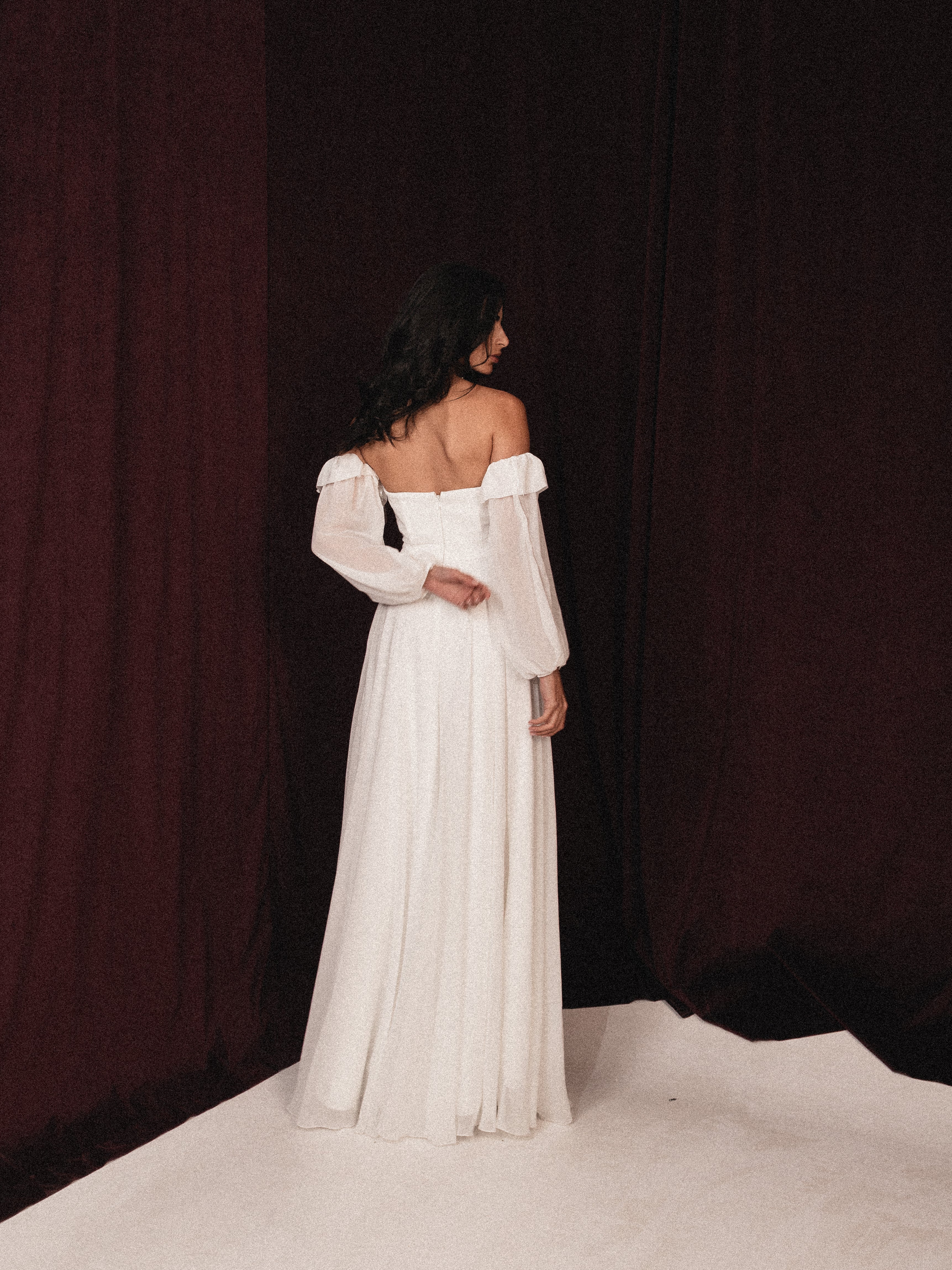Strapless chiffon dress with slit in white